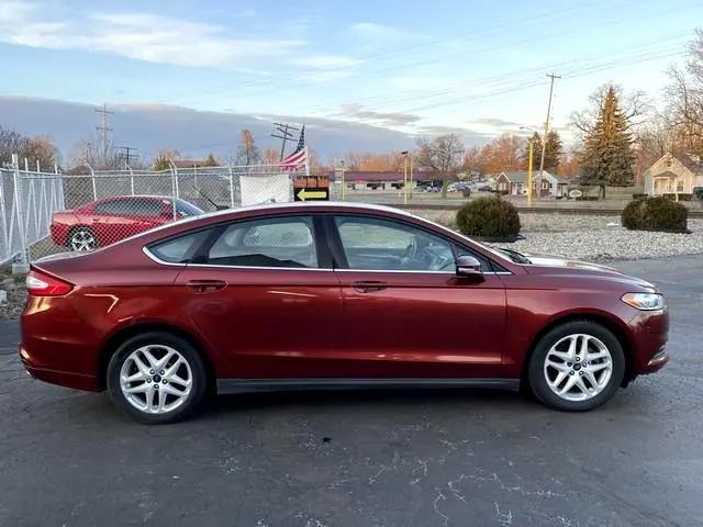 used 2014 Ford Fusion car, priced at $7,995