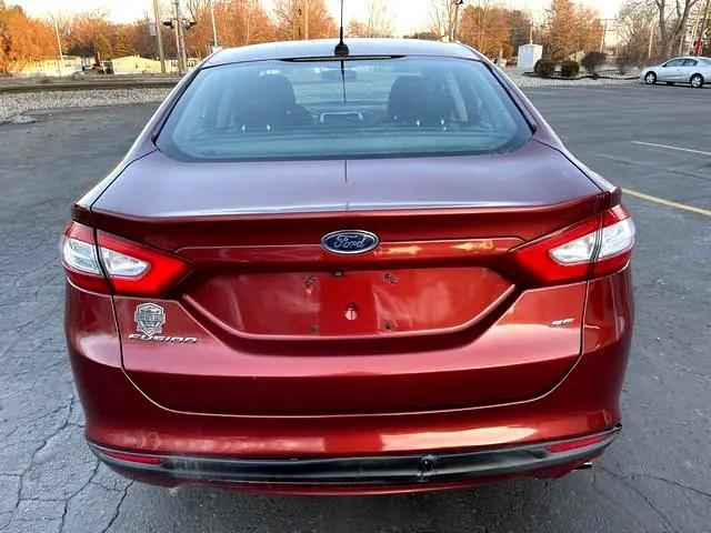 used 2014 Ford Fusion car, priced at $7,995