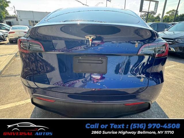 used 2023 Tesla Model Y car, priced at $21,999