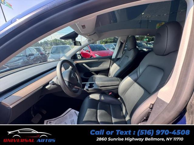 used 2023 Tesla Model Y car, priced at $21,999