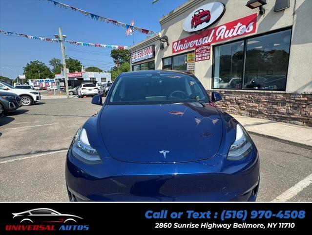 used 2023 Tesla Model Y car, priced at $21,999