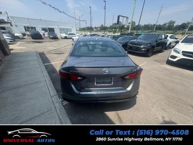 used 2022 Nissan Altima car, priced at $12,999