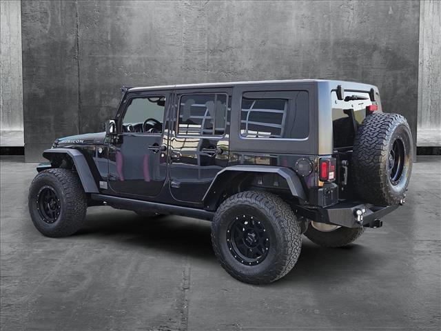 used 2014 Jeep Wrangler Unlimited car, priced at $24,179