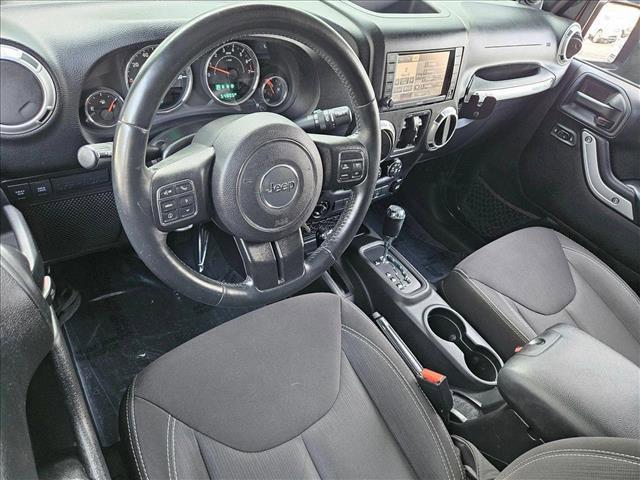used 2014 Jeep Wrangler Unlimited car, priced at $24,179