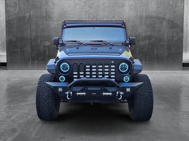 used 2014 Jeep Wrangler Unlimited car, priced at $24,179