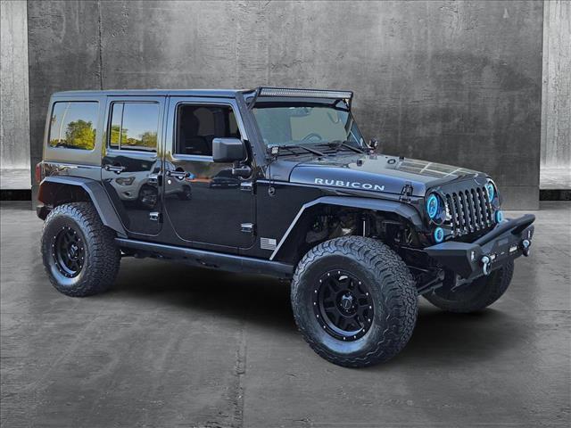 used 2014 Jeep Wrangler Unlimited car, priced at $24,179
