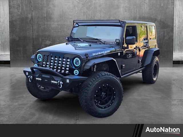 used 2014 Jeep Wrangler Unlimited car, priced at $24,179