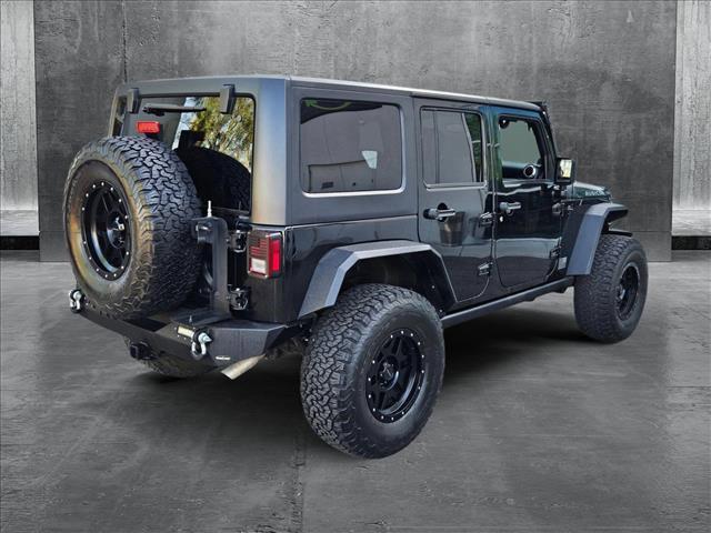 used 2014 Jeep Wrangler Unlimited car, priced at $24,179