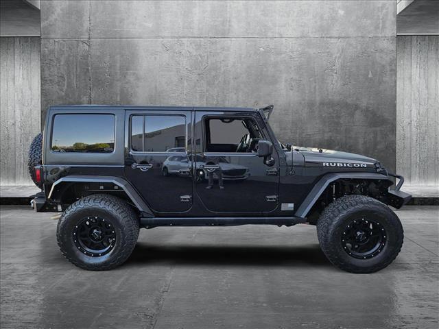 used 2014 Jeep Wrangler Unlimited car, priced at $24,179