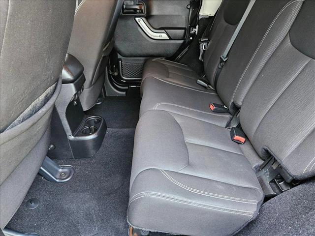 used 2014 Jeep Wrangler Unlimited car, priced at $24,179