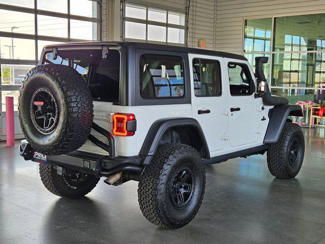 used 2021 Jeep Wrangler Unlimited car, priced at $26,245