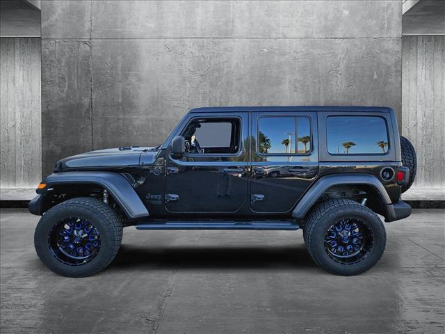 used 2021 Jeep Wrangler Unlimited car, priced at $31,379
