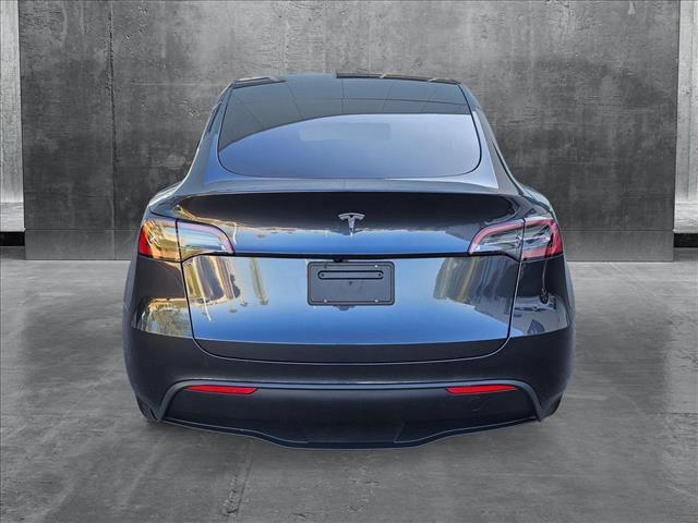 used 2024 Tesla Model Y car, priced at $31,386