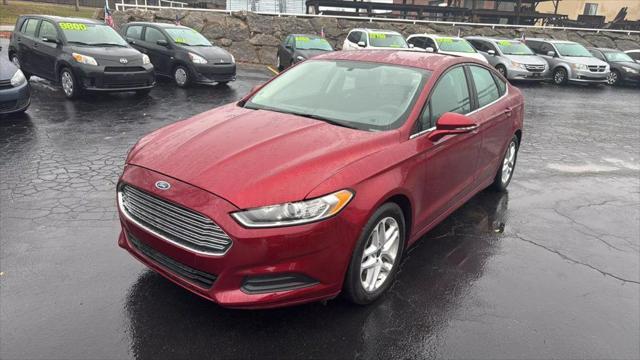 used 2016 Ford Fusion car, priced at $12,980