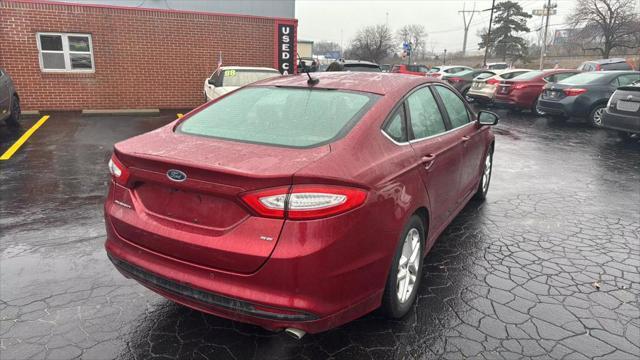 used 2016 Ford Fusion car, priced at $12,980