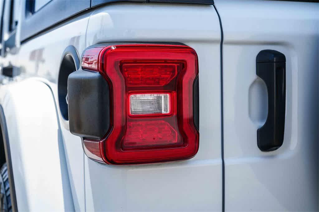 used 2021 Jeep Wrangler Unlimited car, priced at $24,278