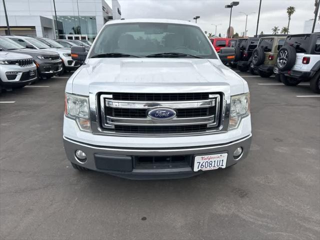 used 2014 Ford F-150 car, priced at $16,000