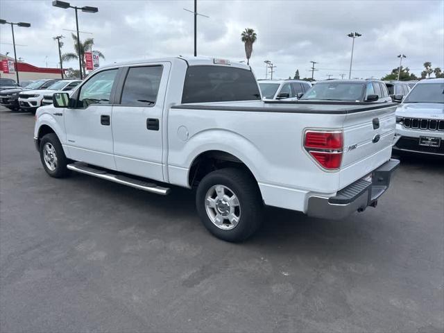 used 2014 Ford F-150 car, priced at $16,000