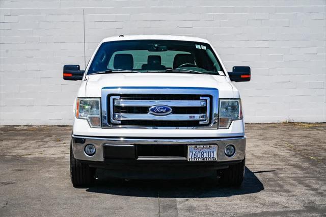 used 2014 Ford F-150 car, priced at $16,672