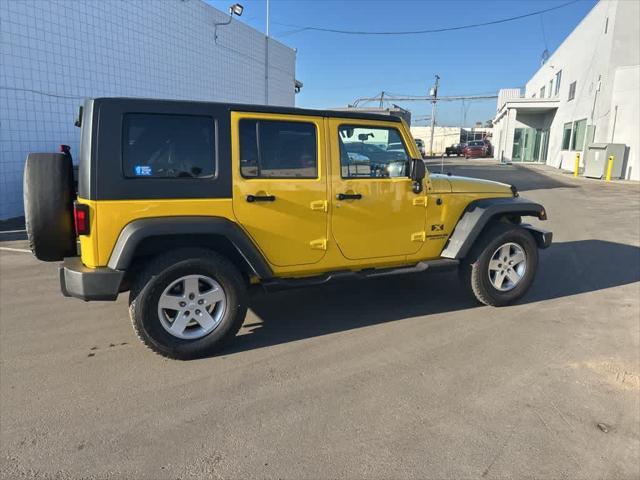 used 2009 Jeep Wrangler Unlimited car, priced at $11,991