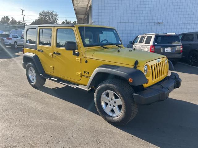 used 2009 Jeep Wrangler Unlimited car, priced at $11,991