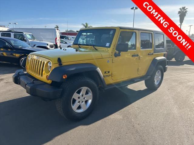 used 2009 Jeep Wrangler Unlimited car, priced at $11,991