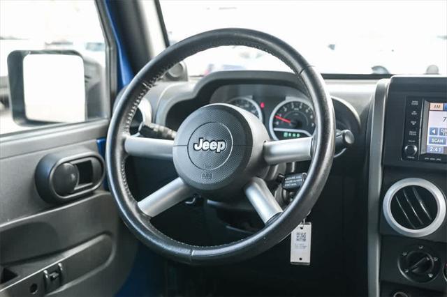used 2009 Jeep Wrangler Unlimited car, priced at $15,579