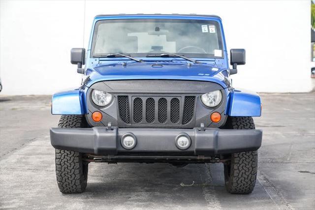used 2009 Jeep Wrangler Unlimited car, priced at $15,579