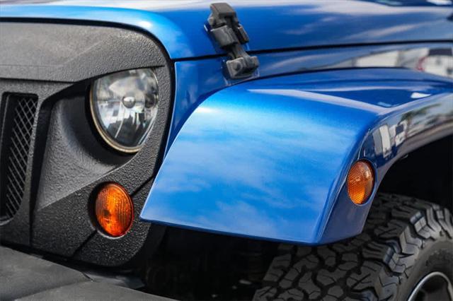 used 2009 Jeep Wrangler Unlimited car, priced at $15,579