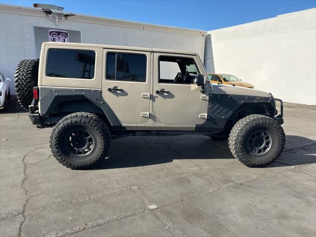 used 2016 Jeep Wrangler Unlimited car, priced at $19,991