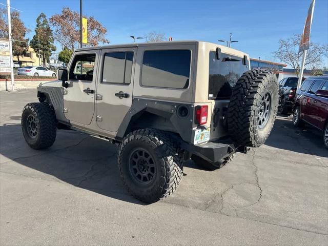 used 2016 Jeep Wrangler Unlimited car, priced at $19,991