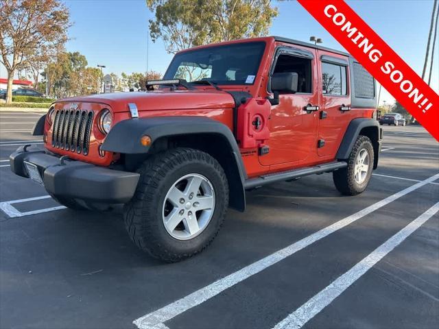 used 2015 Jeep Wrangler Unlimited car, priced at $23,991