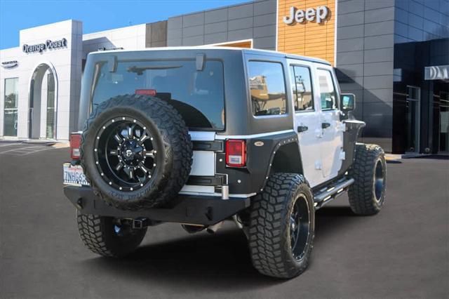 used 2015 Jeep Wrangler Unlimited car, priced at $21,499