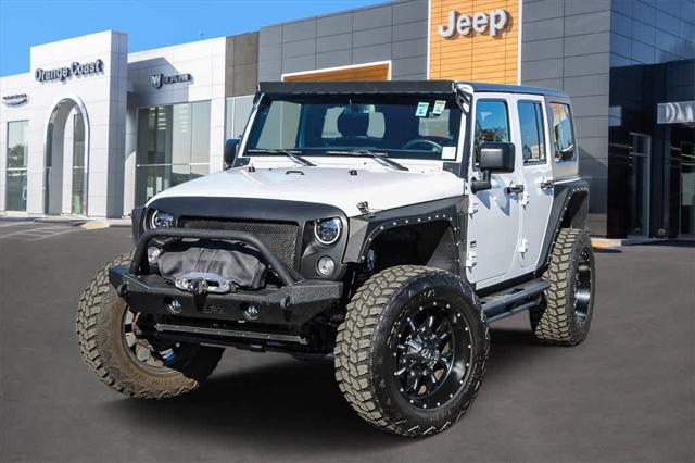 used 2015 Jeep Wrangler Unlimited car, priced at $21,499