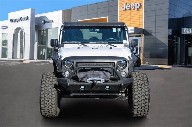 used 2015 Jeep Wrangler Unlimited car, priced at $21,499