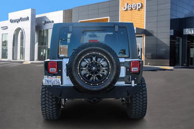 used 2015 Jeep Wrangler Unlimited car, priced at $21,499