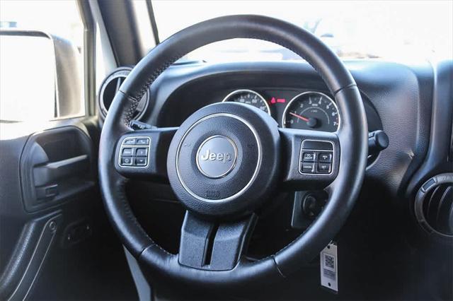 used 2015 Jeep Wrangler Unlimited car, priced at $21,499