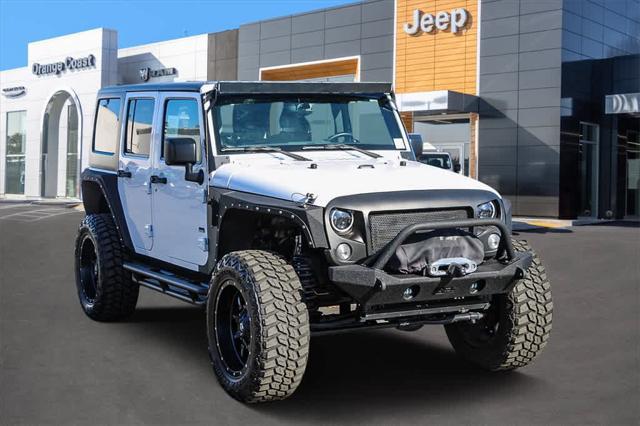 used 2015 Jeep Wrangler Unlimited car, priced at $21,499