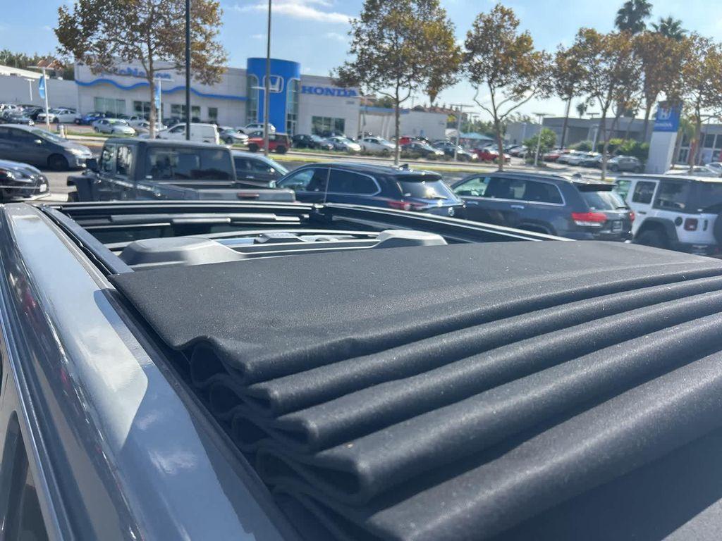 used 2023 Jeep Wrangler 4xe car, priced at $36,972