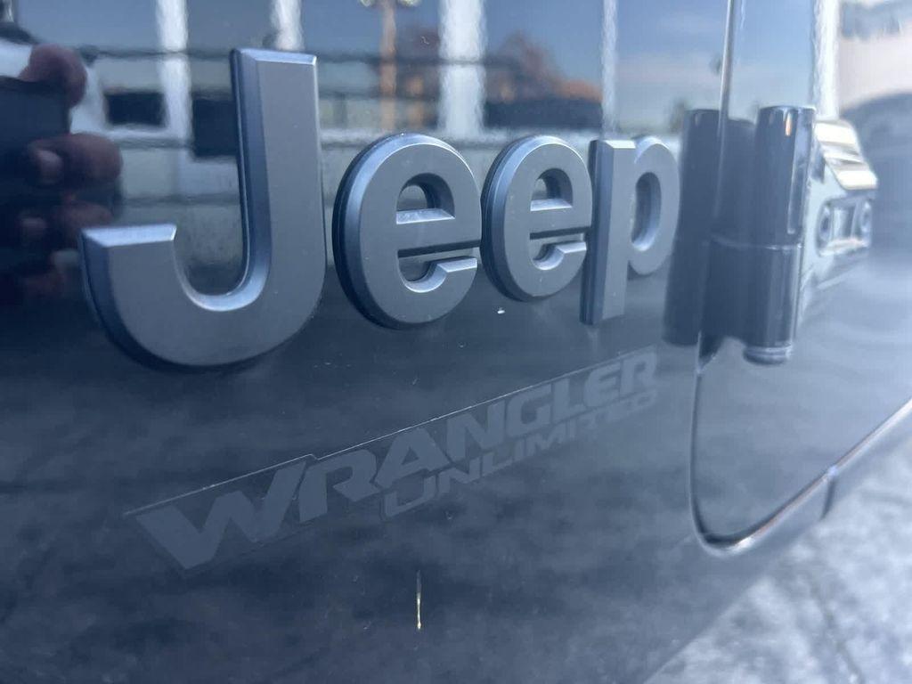 used 2021 Jeep Wrangler Unlimited car, priced at $27,972