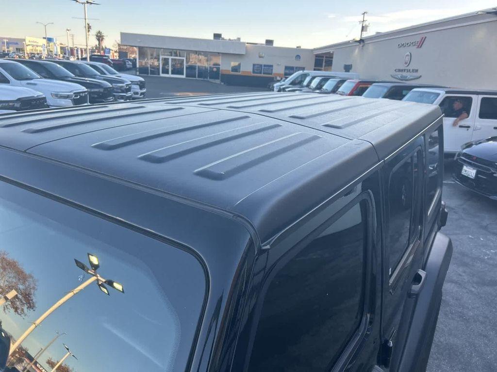 used 2021 Jeep Wrangler Unlimited car, priced at $27,972