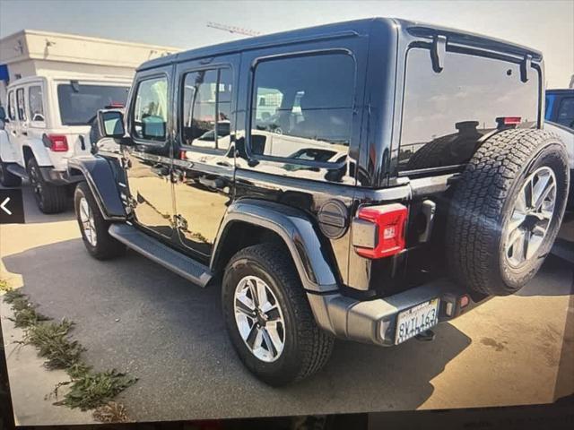 used 2021 Jeep Wrangler Unlimited car, priced at $36,180