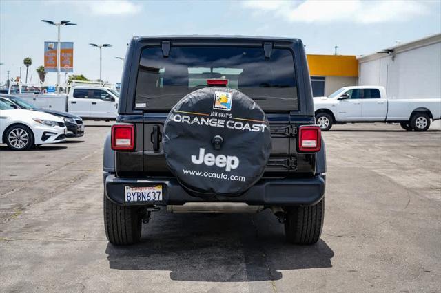 used 2021 Jeep Wrangler Unlimited car, priced at $25,507