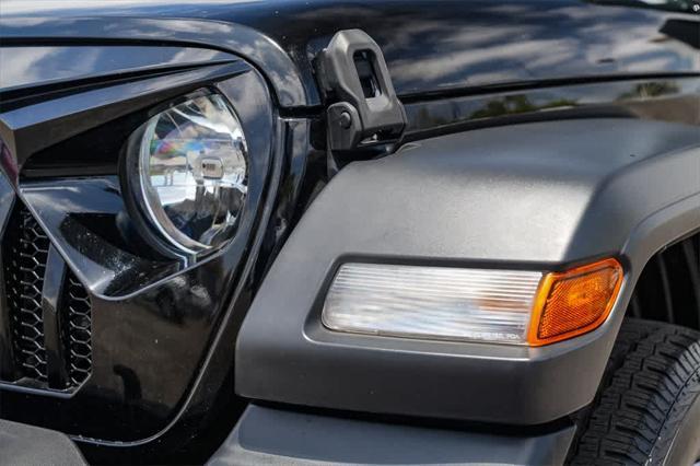 used 2021 Jeep Wrangler Unlimited car, priced at $25,507