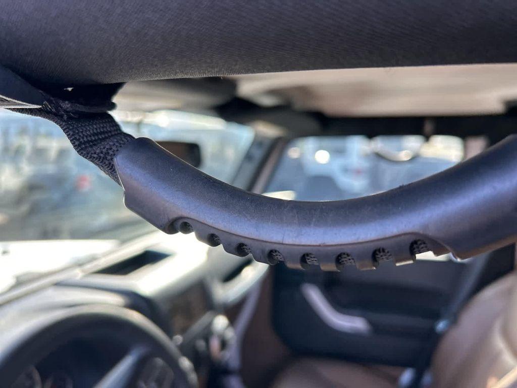 used 2015 Jeep Wrangler Unlimited car, priced at $17,972