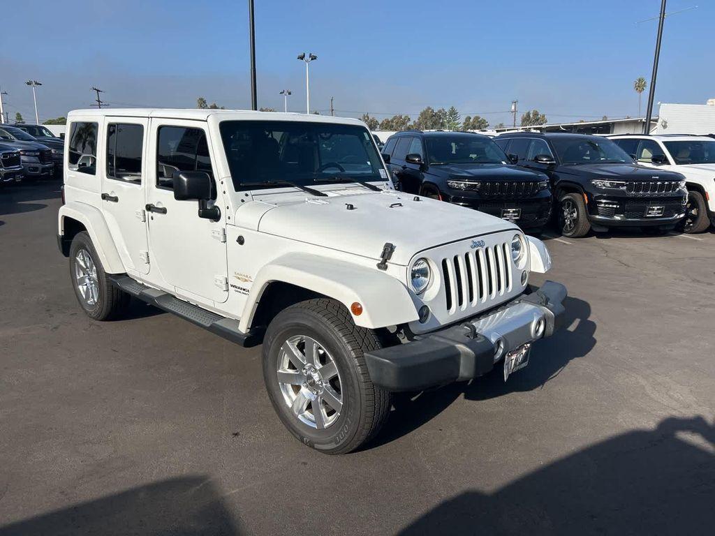 used 2015 Jeep Wrangler Unlimited car, priced at $17,972