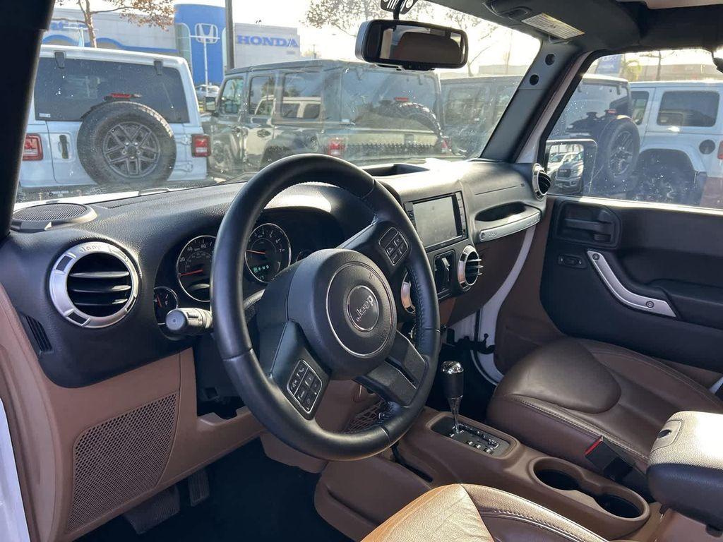 used 2015 Jeep Wrangler Unlimited car, priced at $17,972