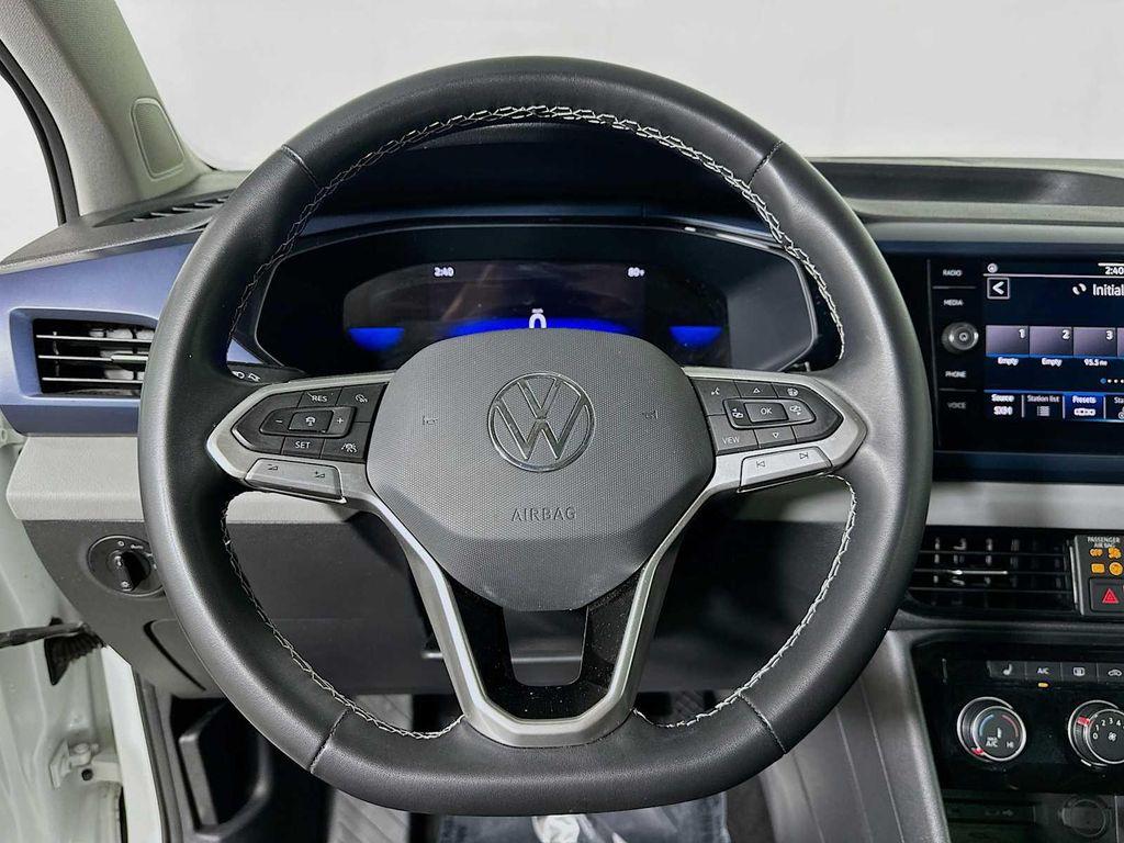 used 2023 Volkswagen Taos car, priced at $19,900