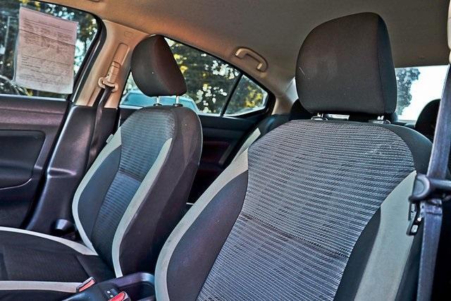 used 2021 Nissan Versa car, priced at $15,490
