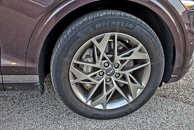 used 2023 Genesis GV70 car, priced at $38,445